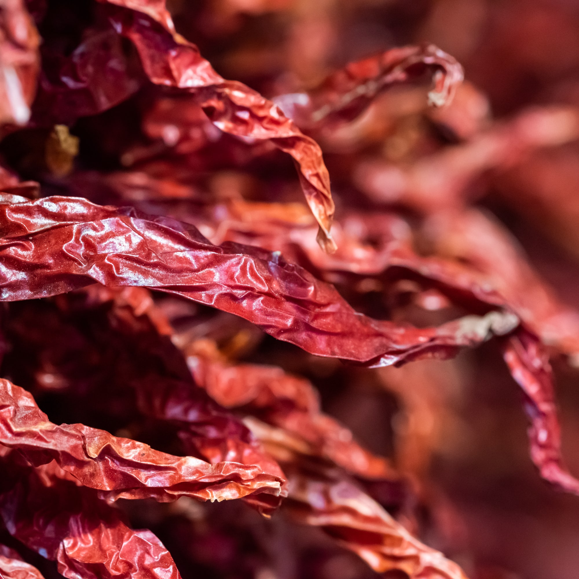 a close up of dried red peppers