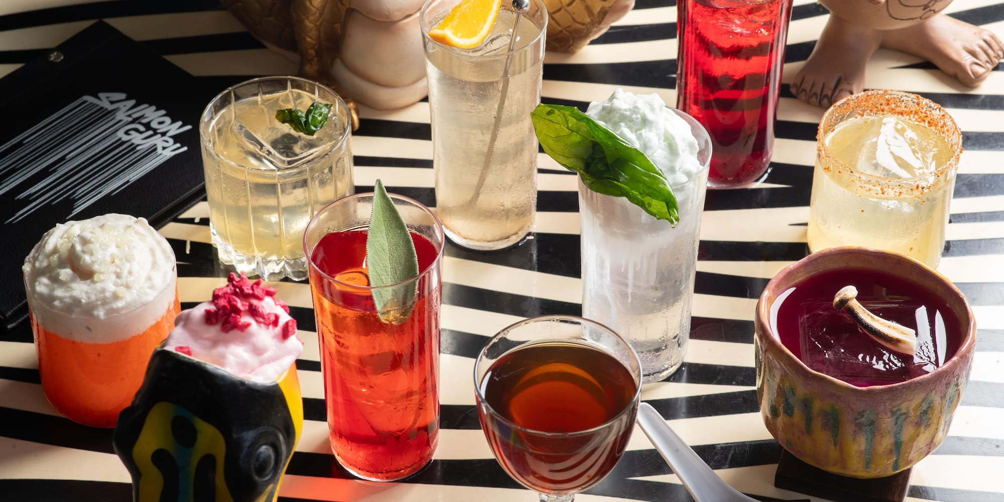 a table with different drinks on it