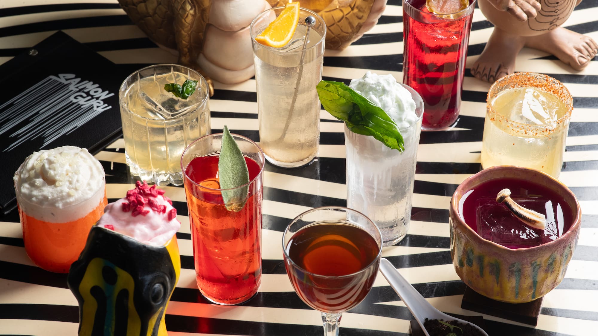a table with different drinks on it