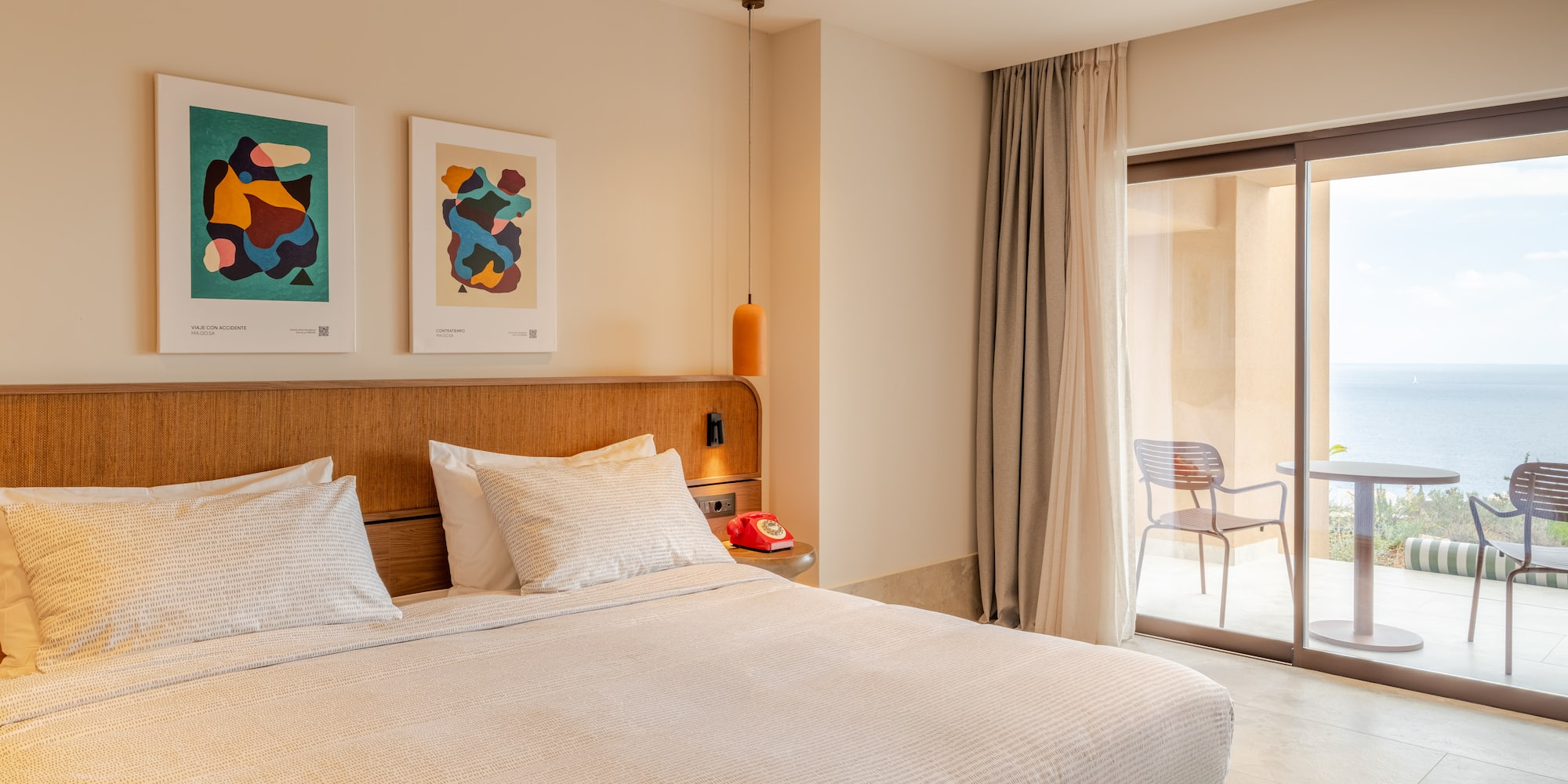 a bed with a wood headboard and a ceiling fan