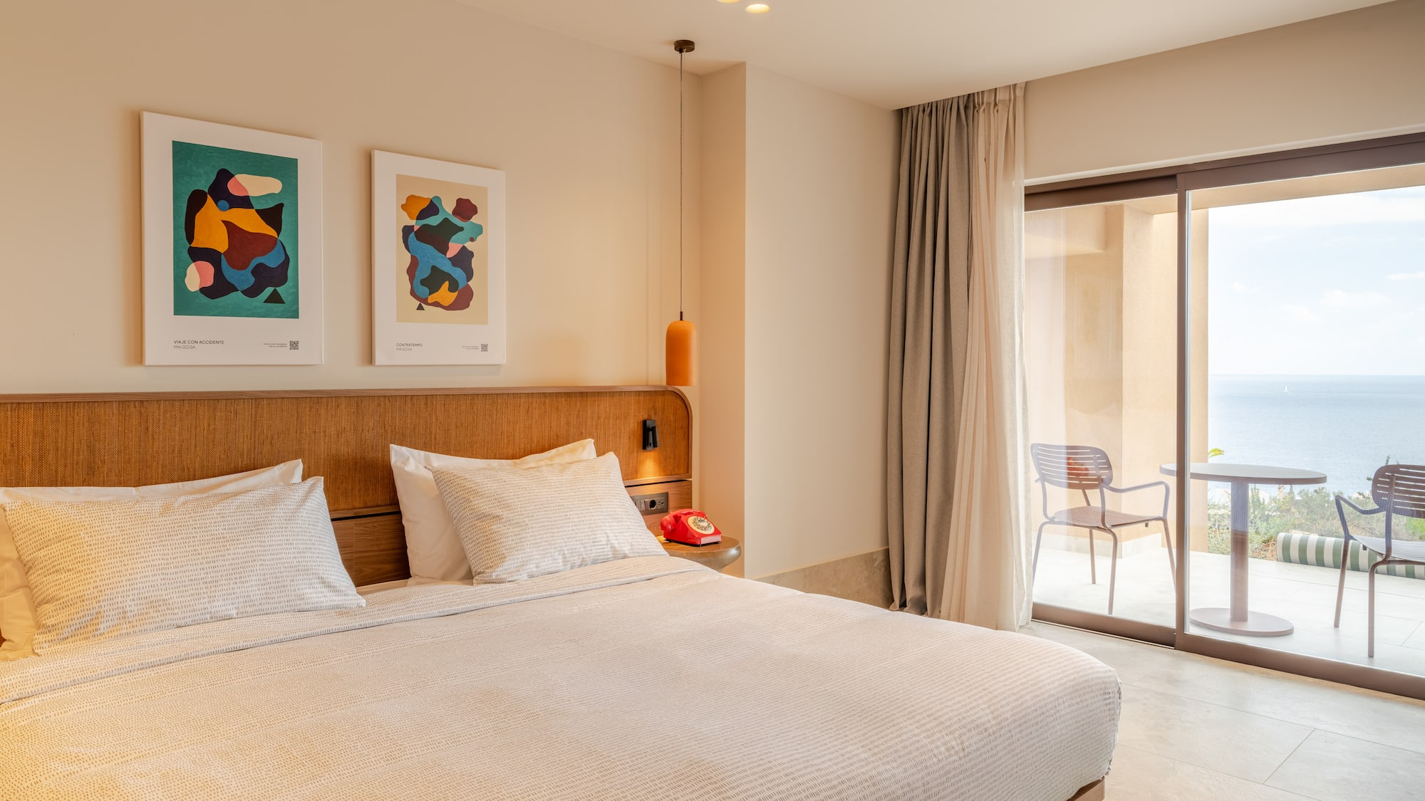 a bed with a wood headboard and a ceiling fan