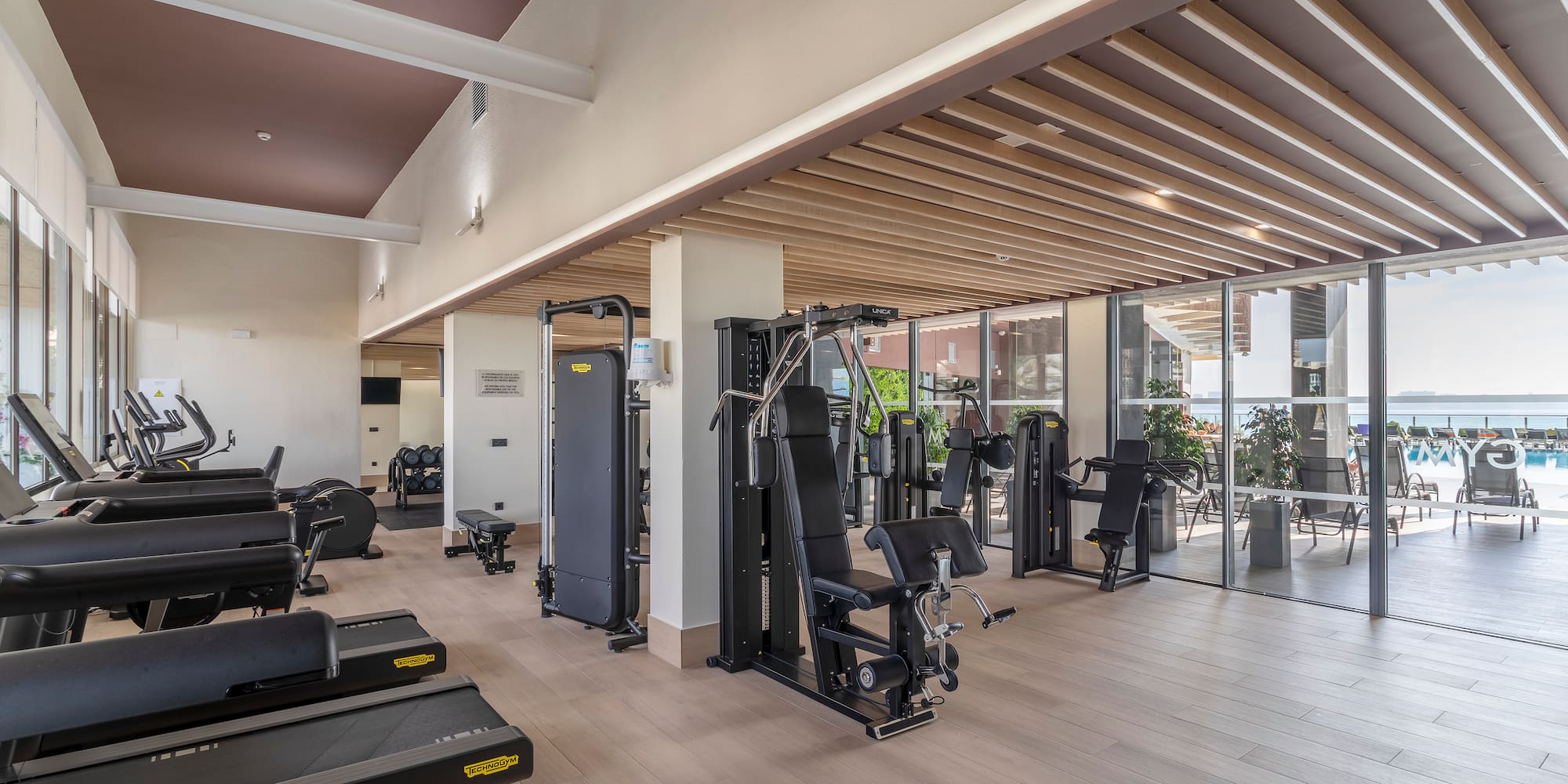 a large room with exercise equipment