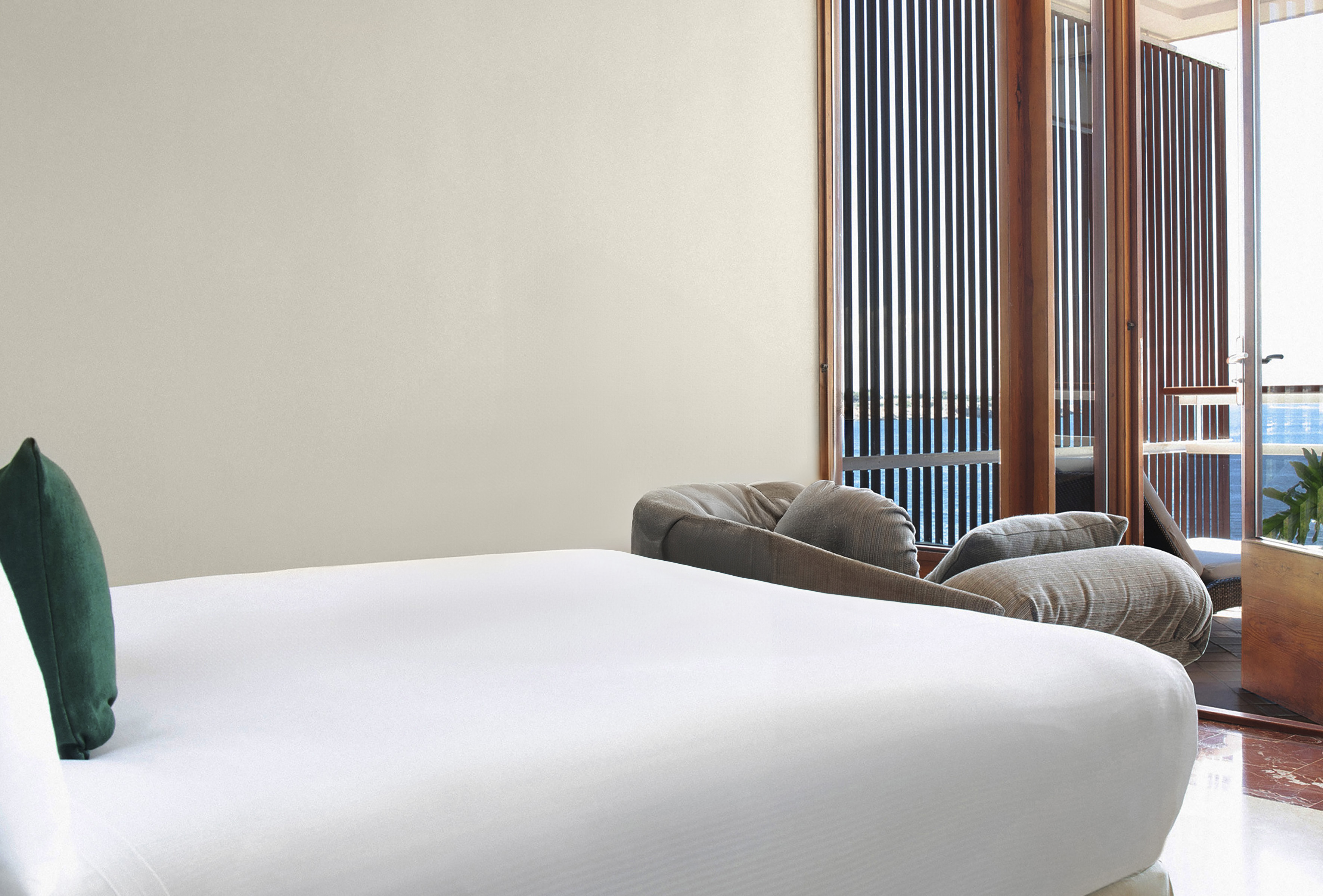 a bed and a couch in a room