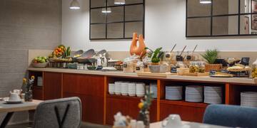 a buffet table with food on it