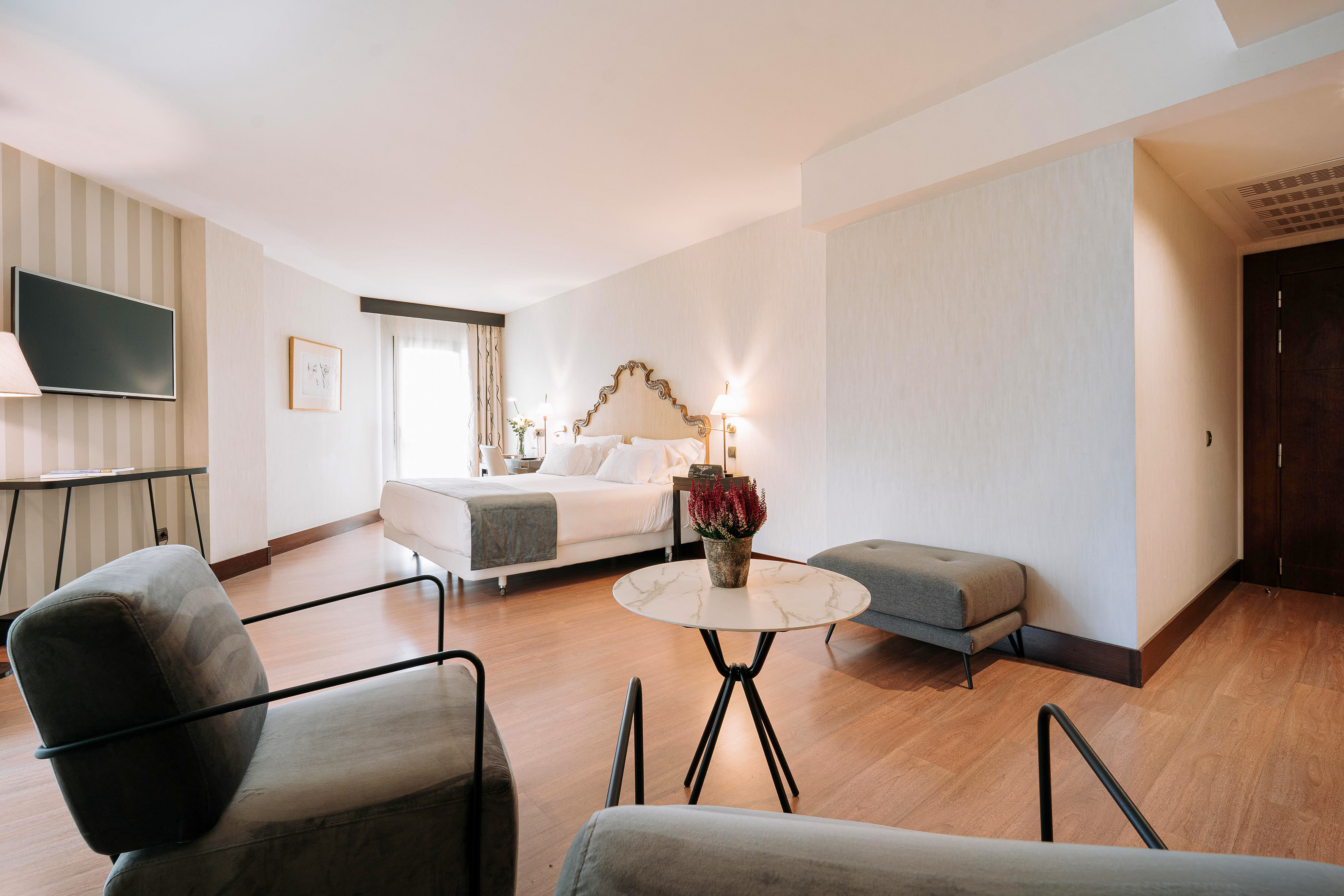 a room with a bed and a table