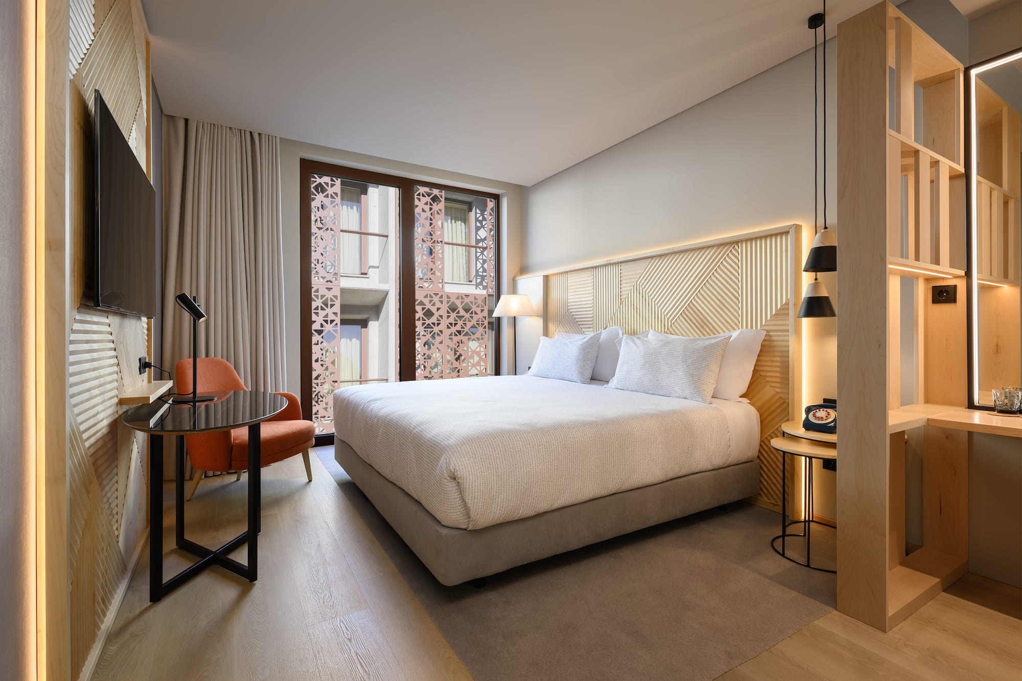 a room with a bed and a chair