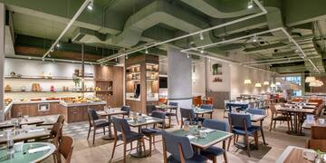 a room with tables and chairs