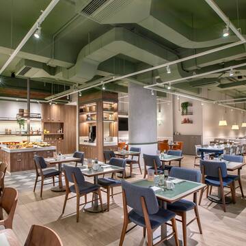 a room with tables and chairs