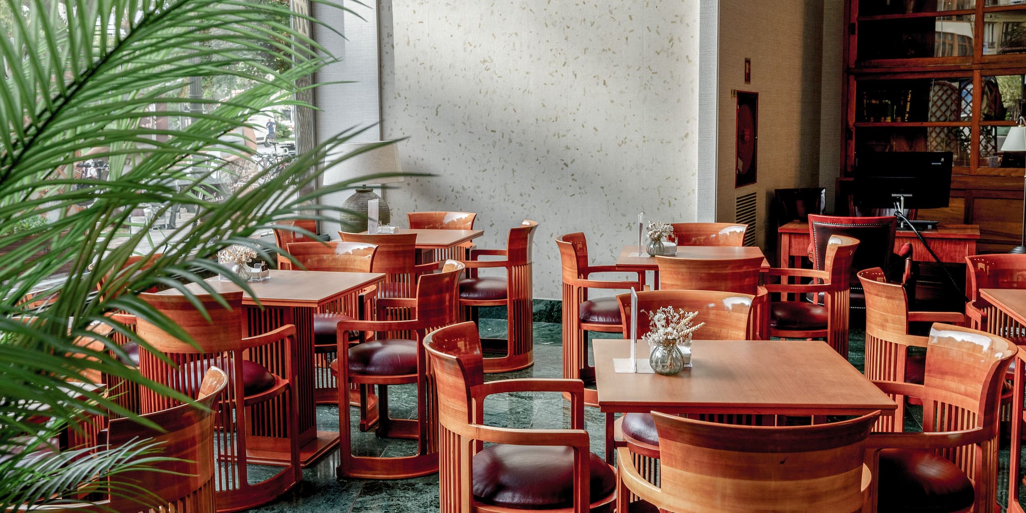 a room with tables and chairs