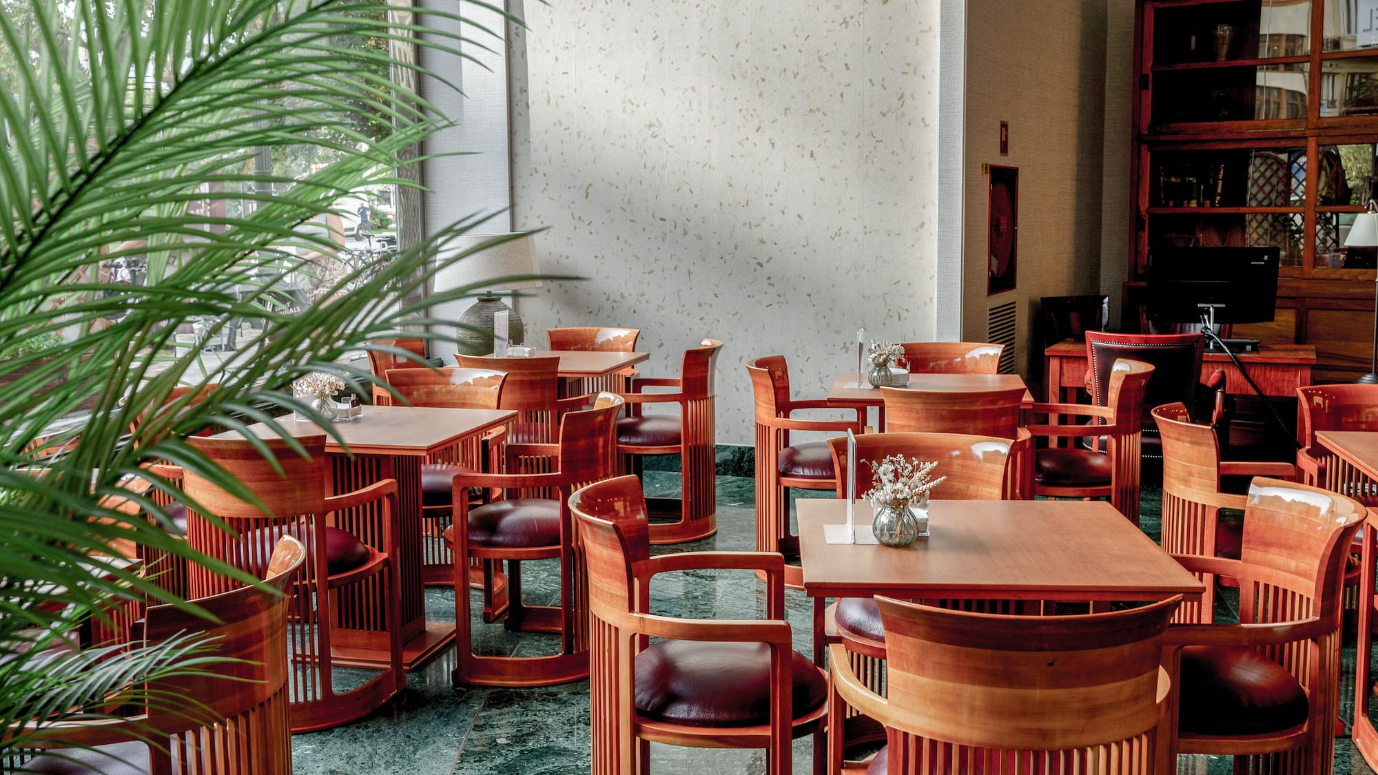 a room with tables and chairs