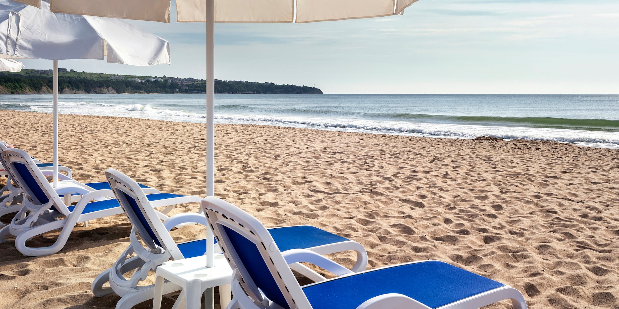chairs and umbrellas on a beach
