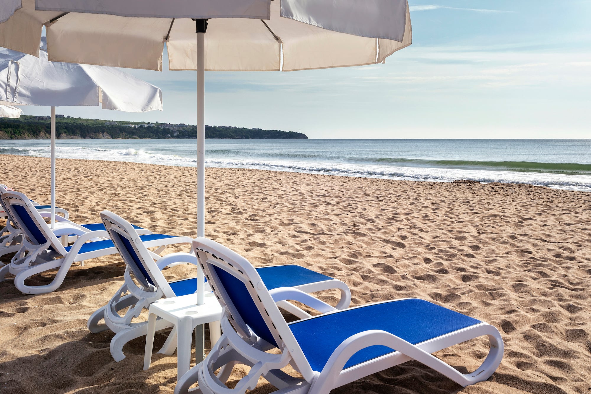 chairs and umbrellas on a beach