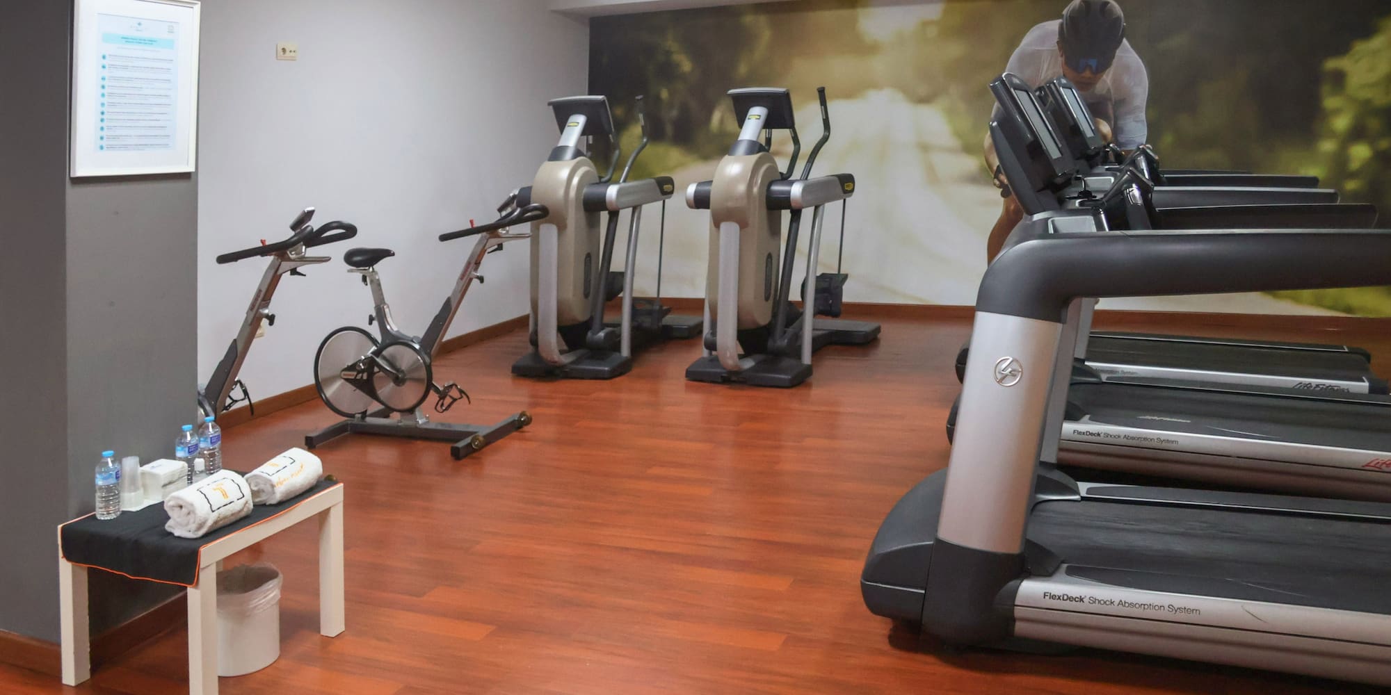 a room with exercise bikes and exercise machines