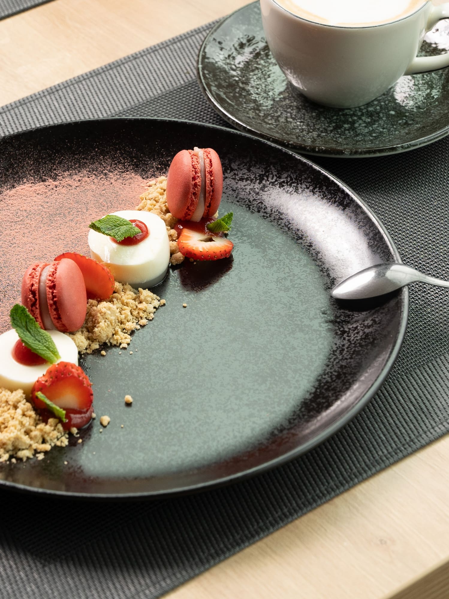 a plate of dessert and a cup of coffee