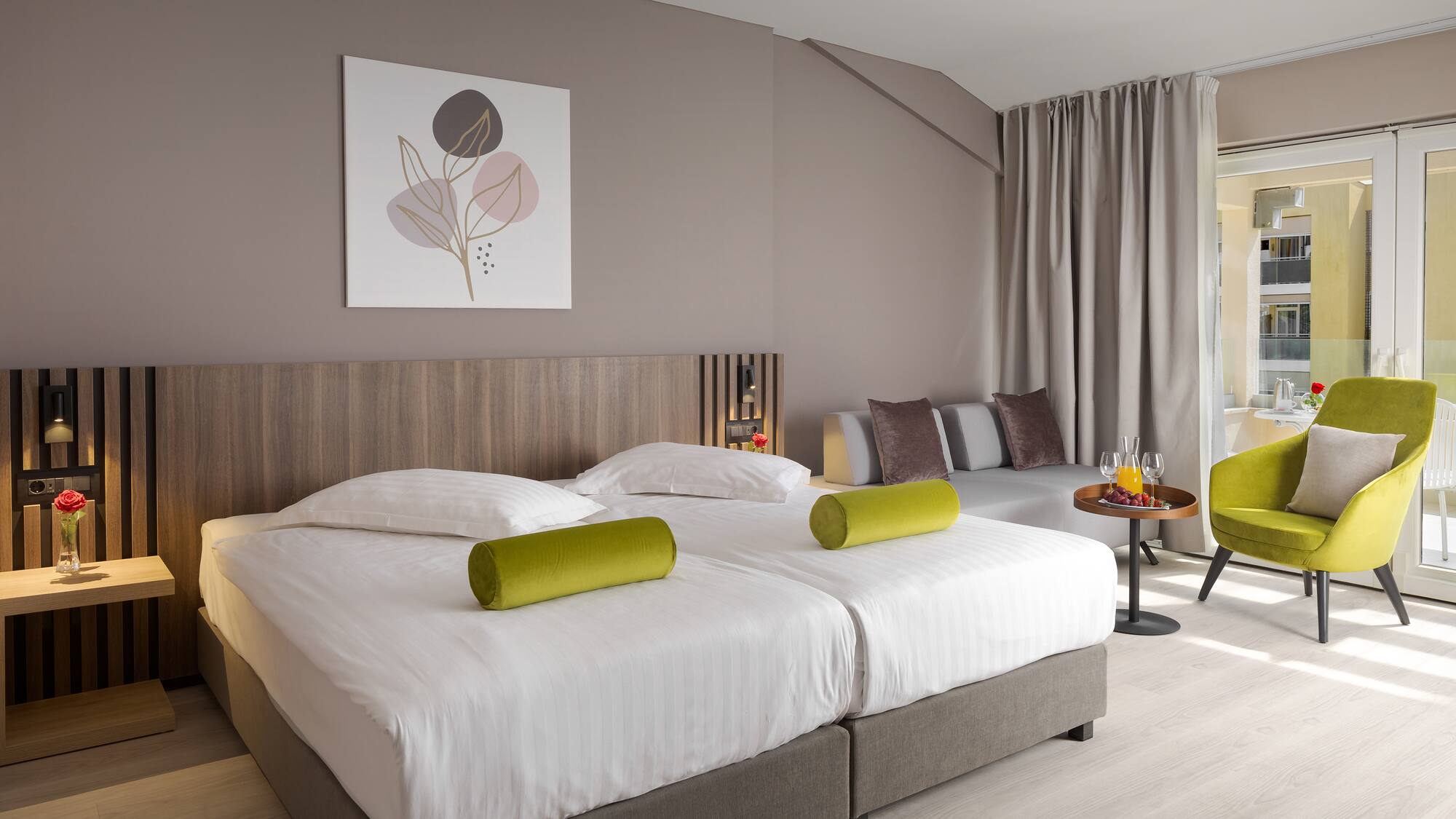 a room with two beds and a table