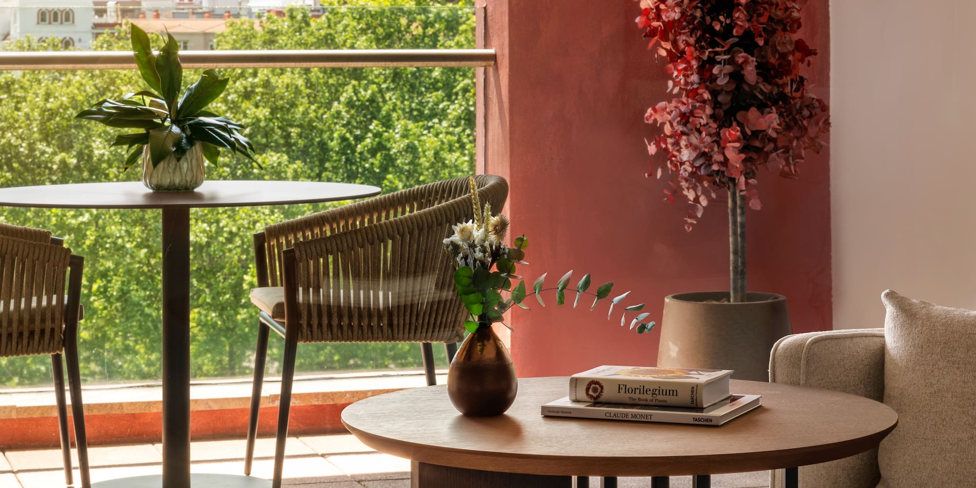 a table and chairs on a balcony