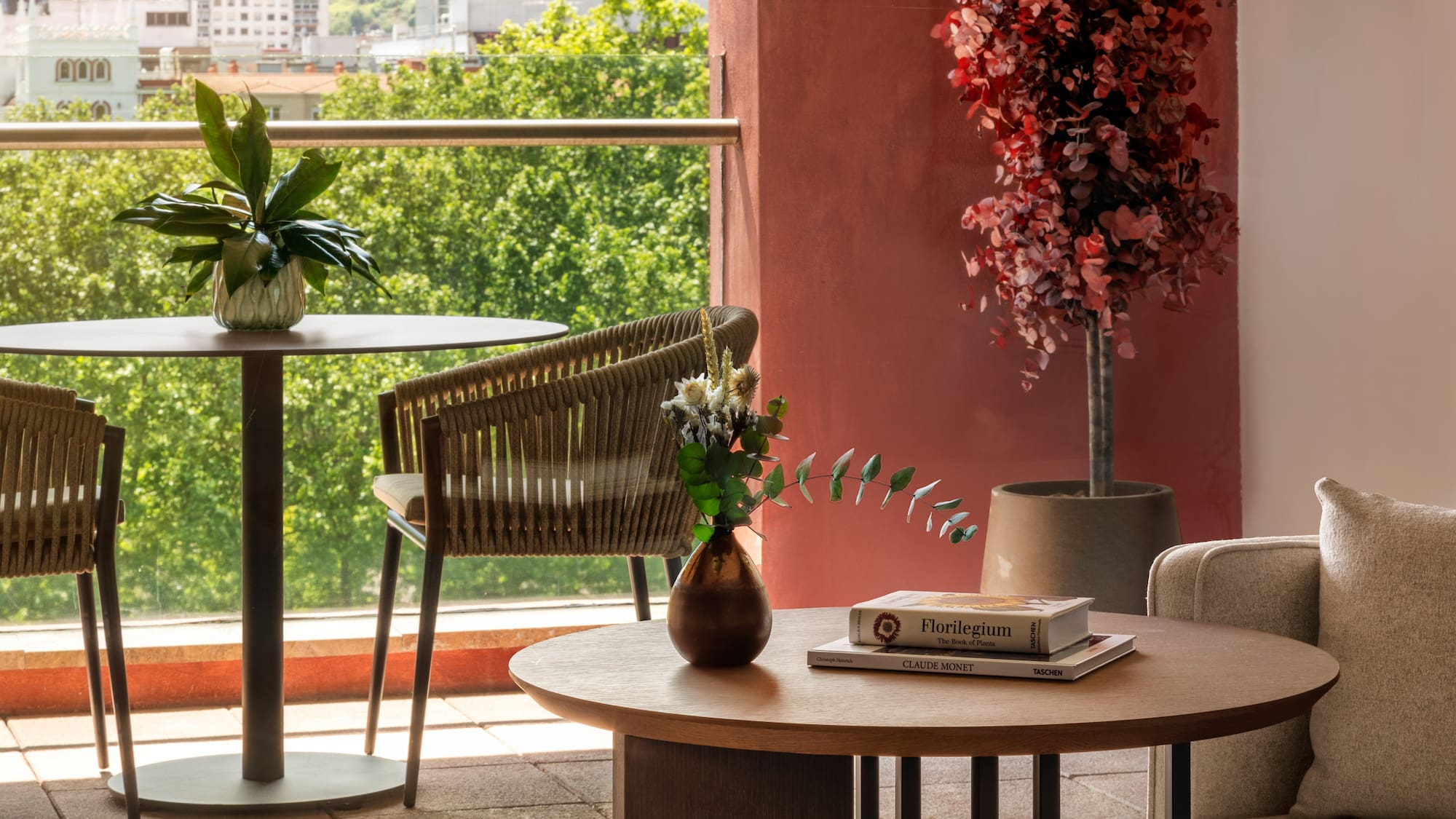 a table and chairs on a balcony