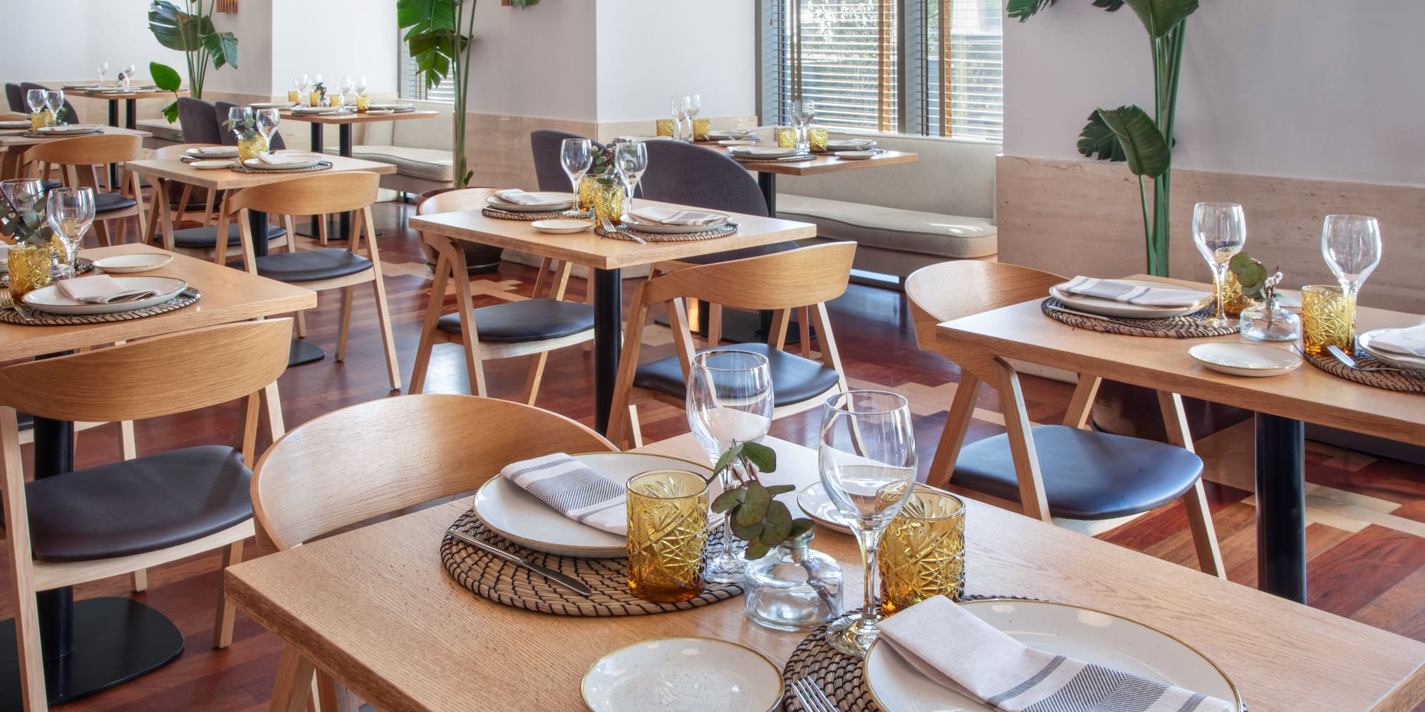 a restaurant with tables and chairs