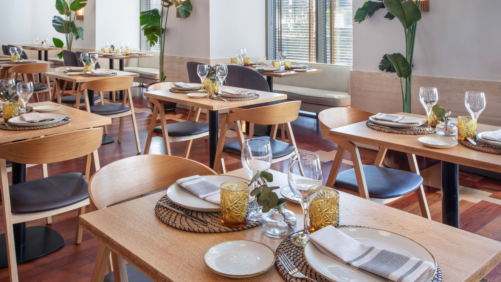 a restaurant with tables and chairs