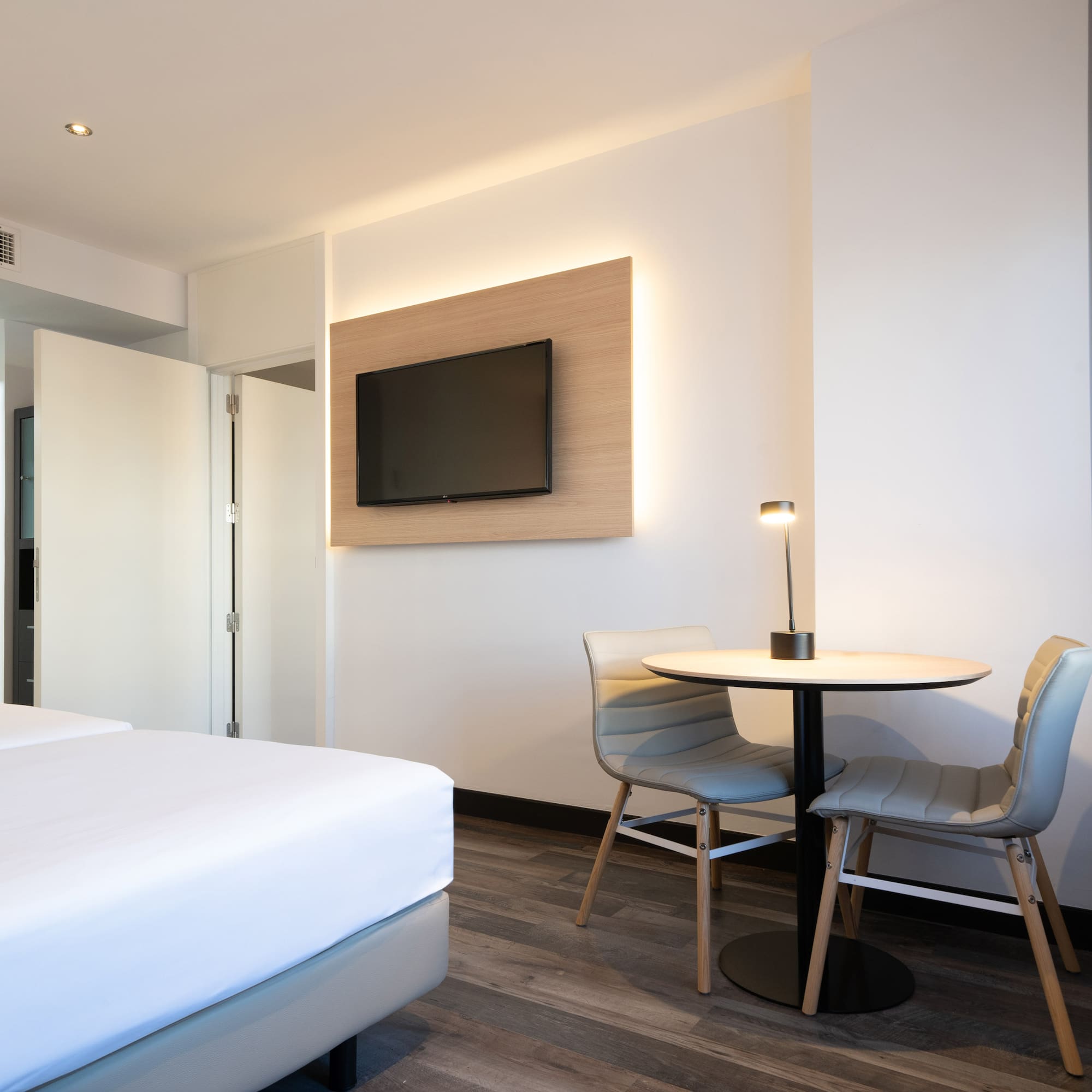 a room with a table and chairs