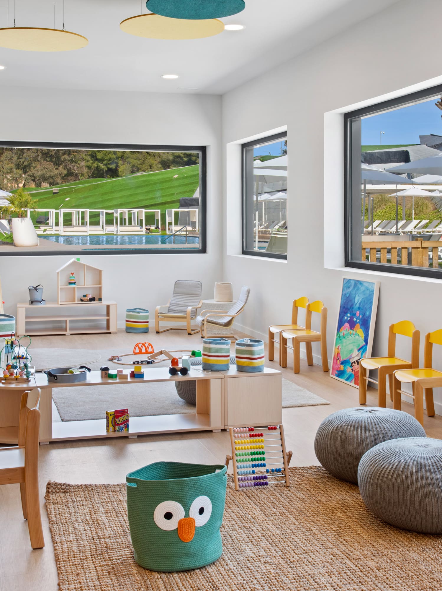 a room with a large table and chairs