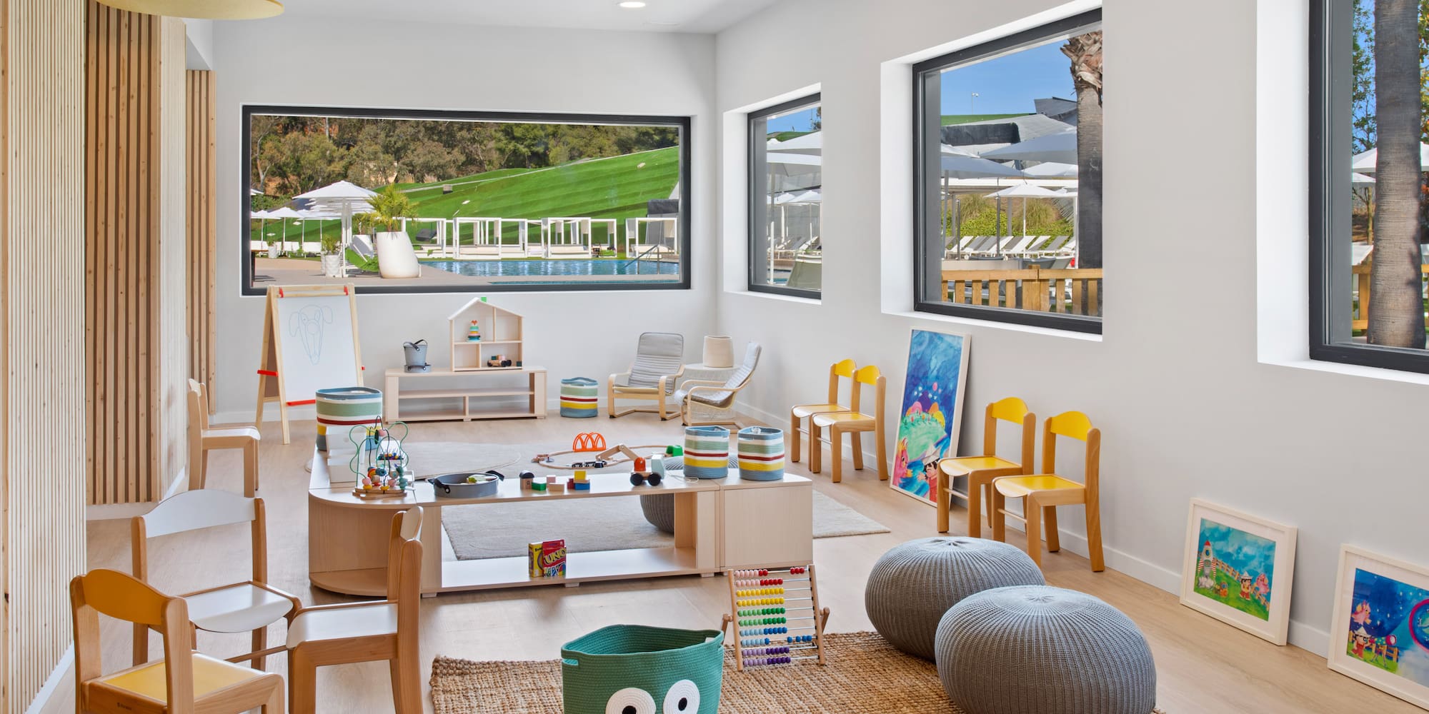 a room with a large table and chairs