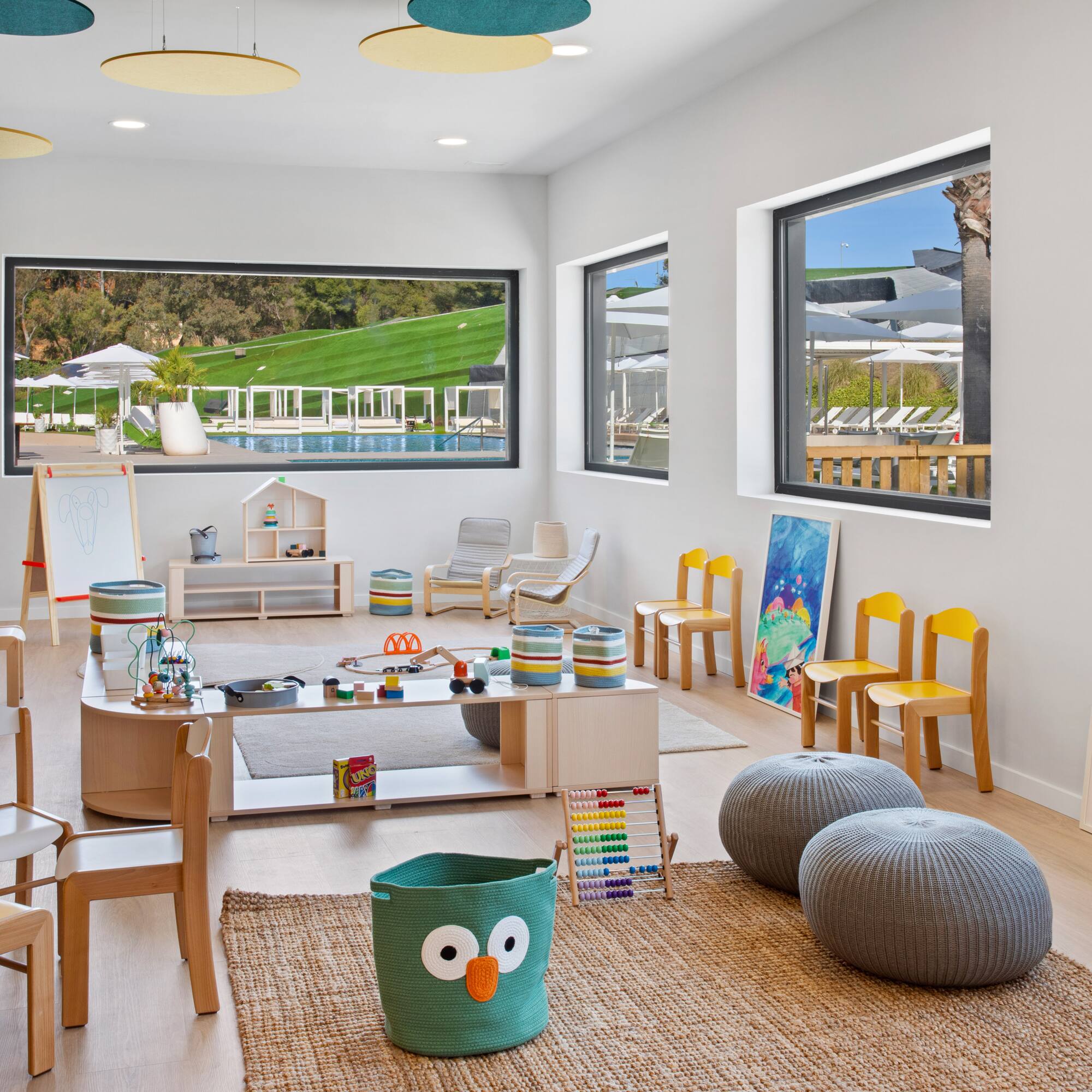 a room with a large table and chairs