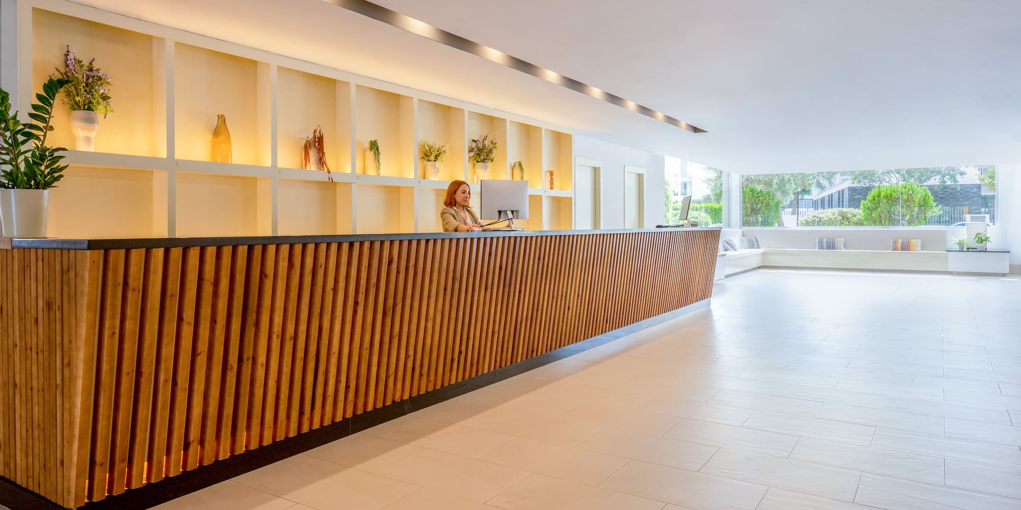 a woman at a reception desk