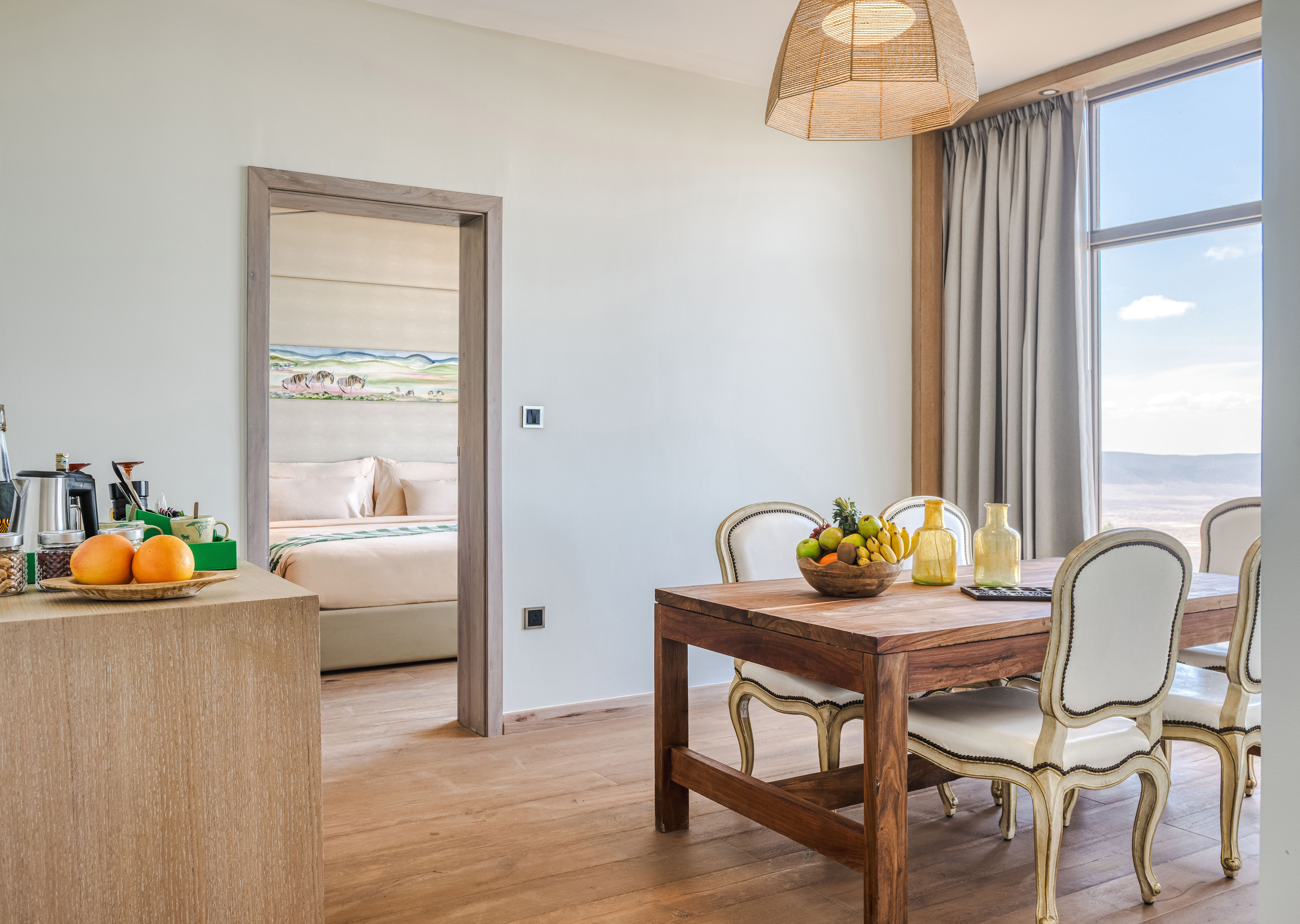 a room with a table and chairs