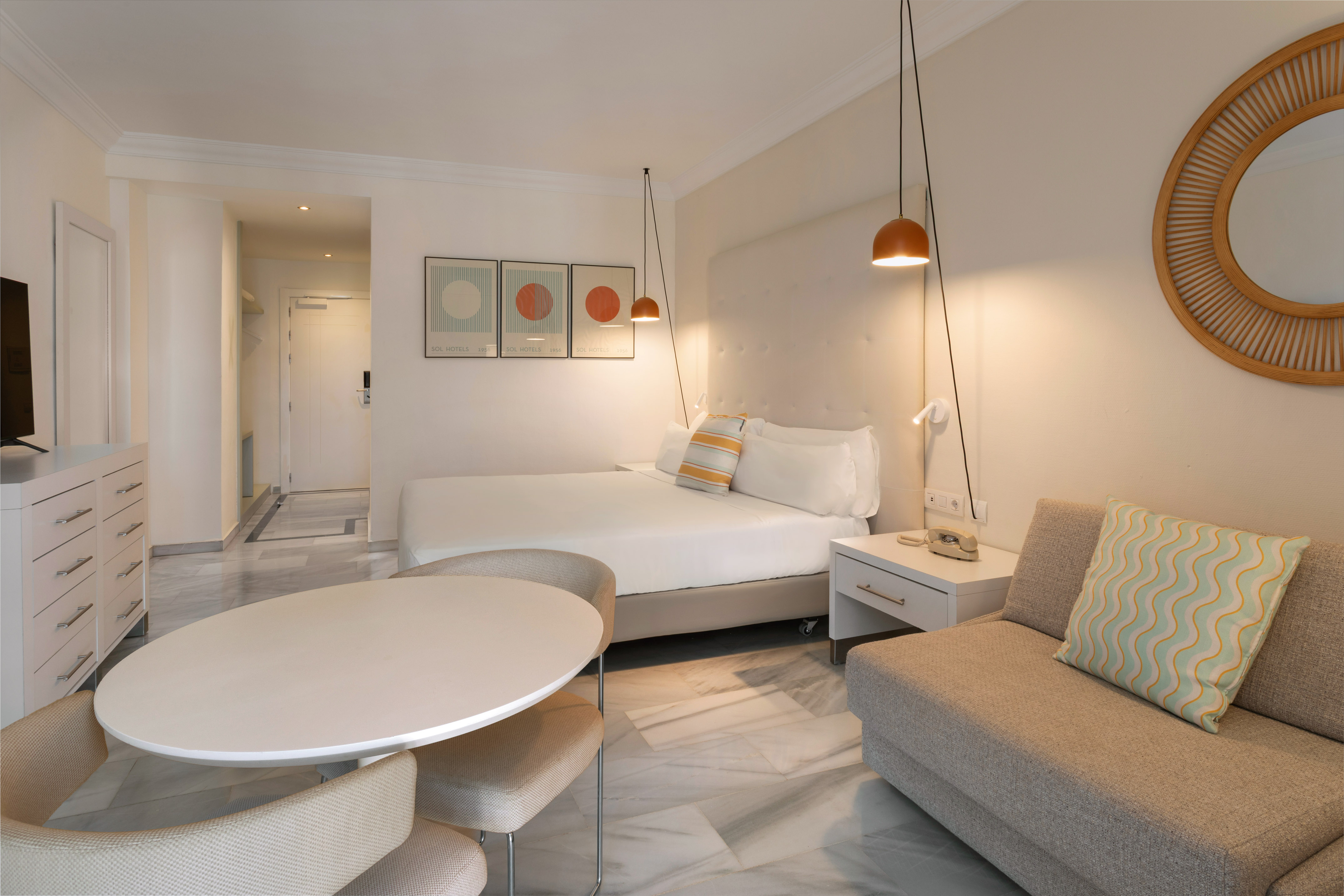 a room with a bed and a couch