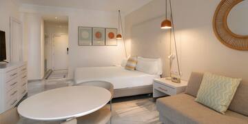 a room with a bed and a couch