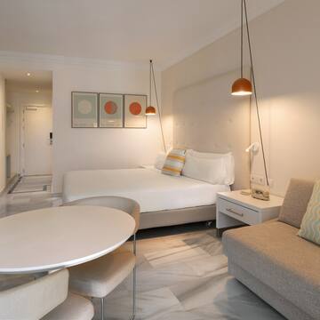 a room with a bed and a couch