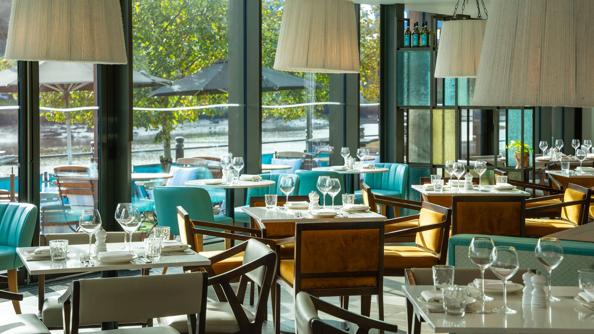 a restaurant with tables and chairs