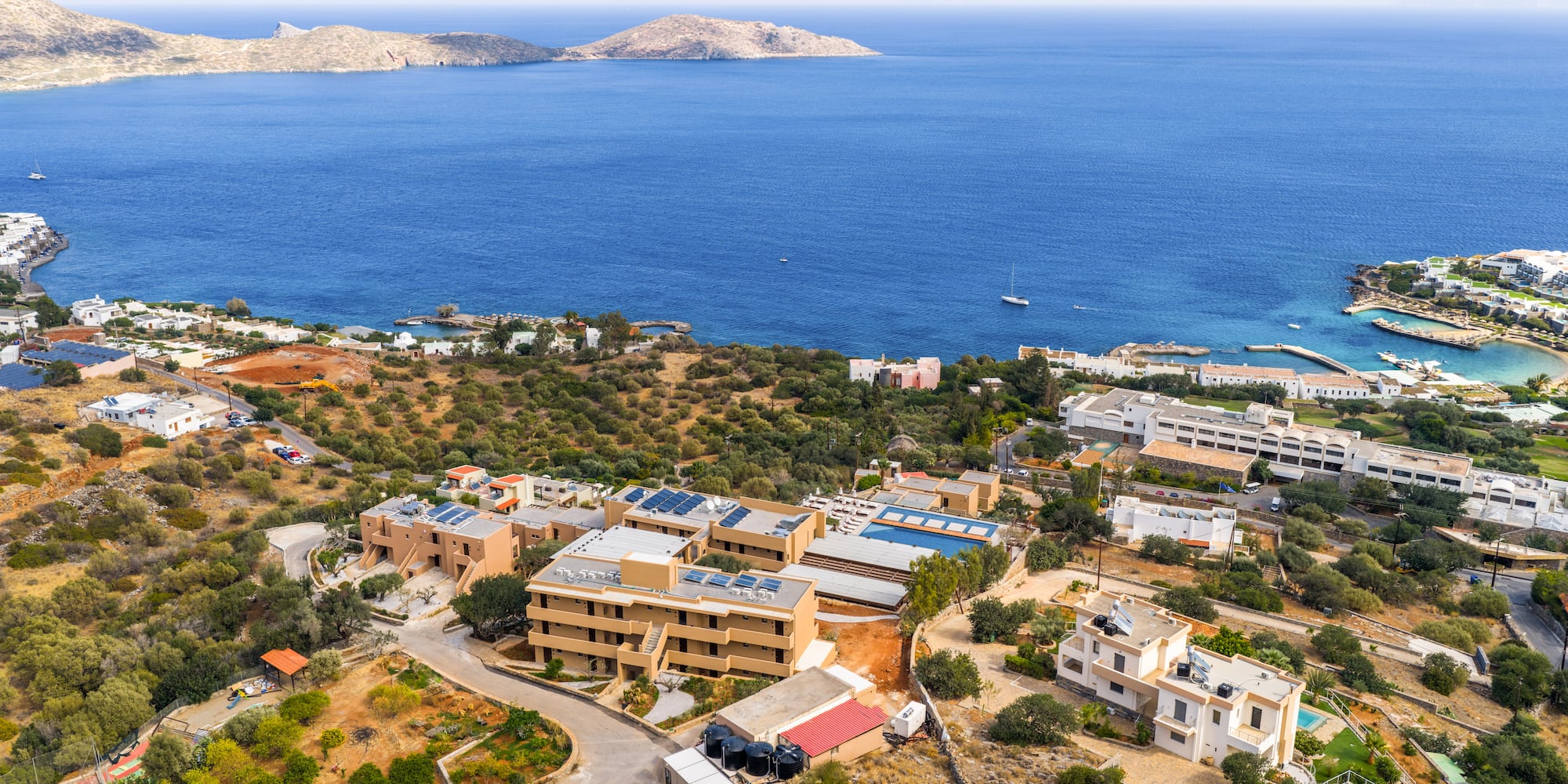 a aerial view of a town by the water