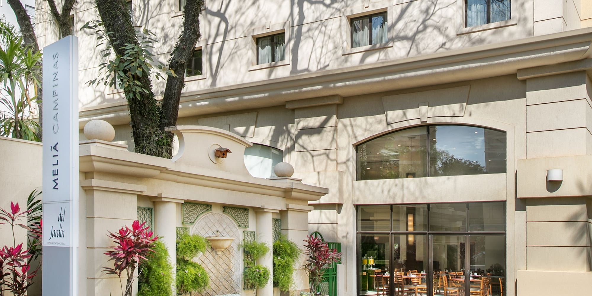 a building with a tree in front of it