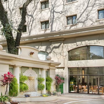 a building with a tree in front of it