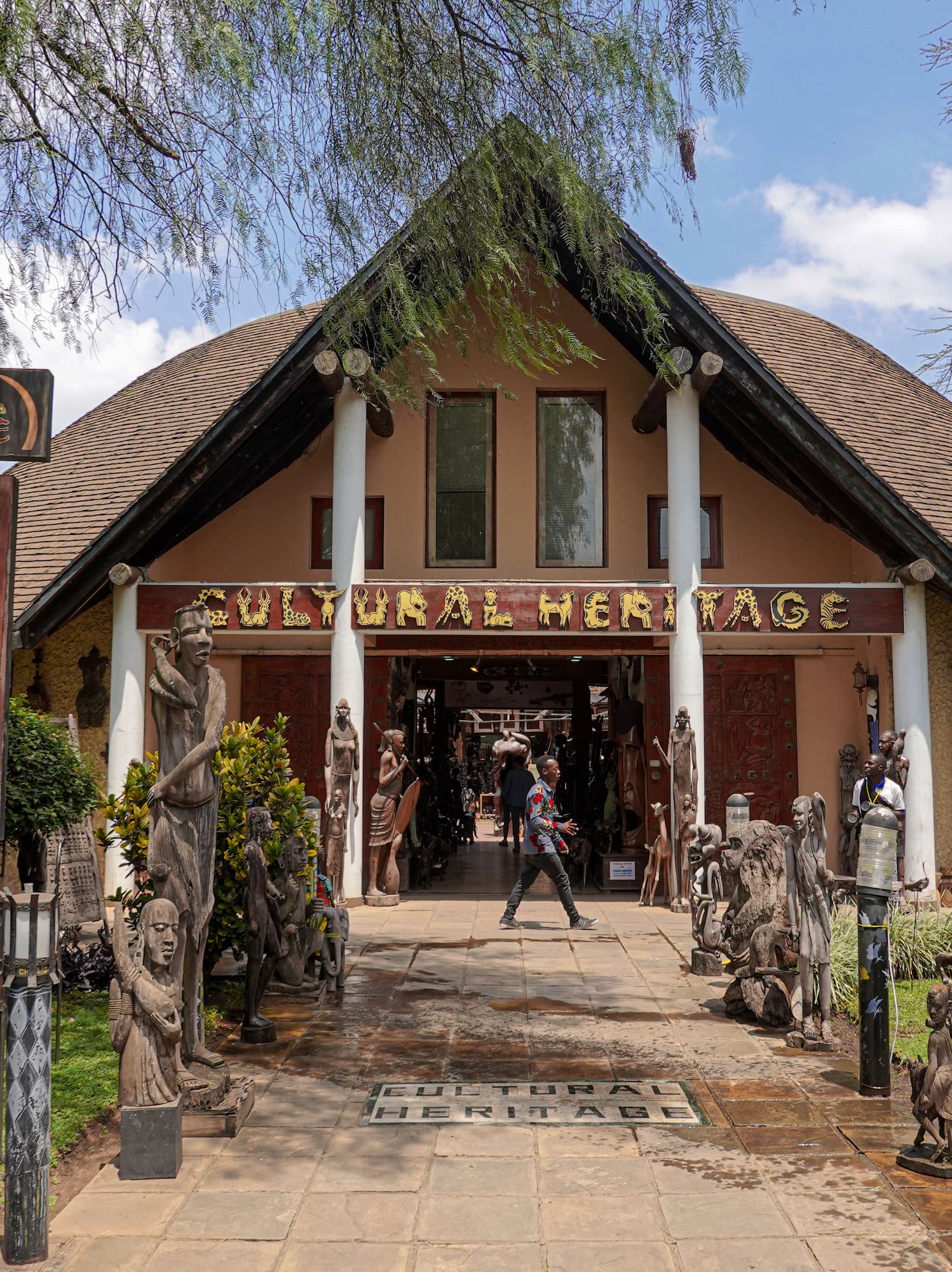 a building with statues in front of it
