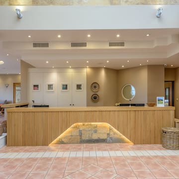 a reception desk in a hotel