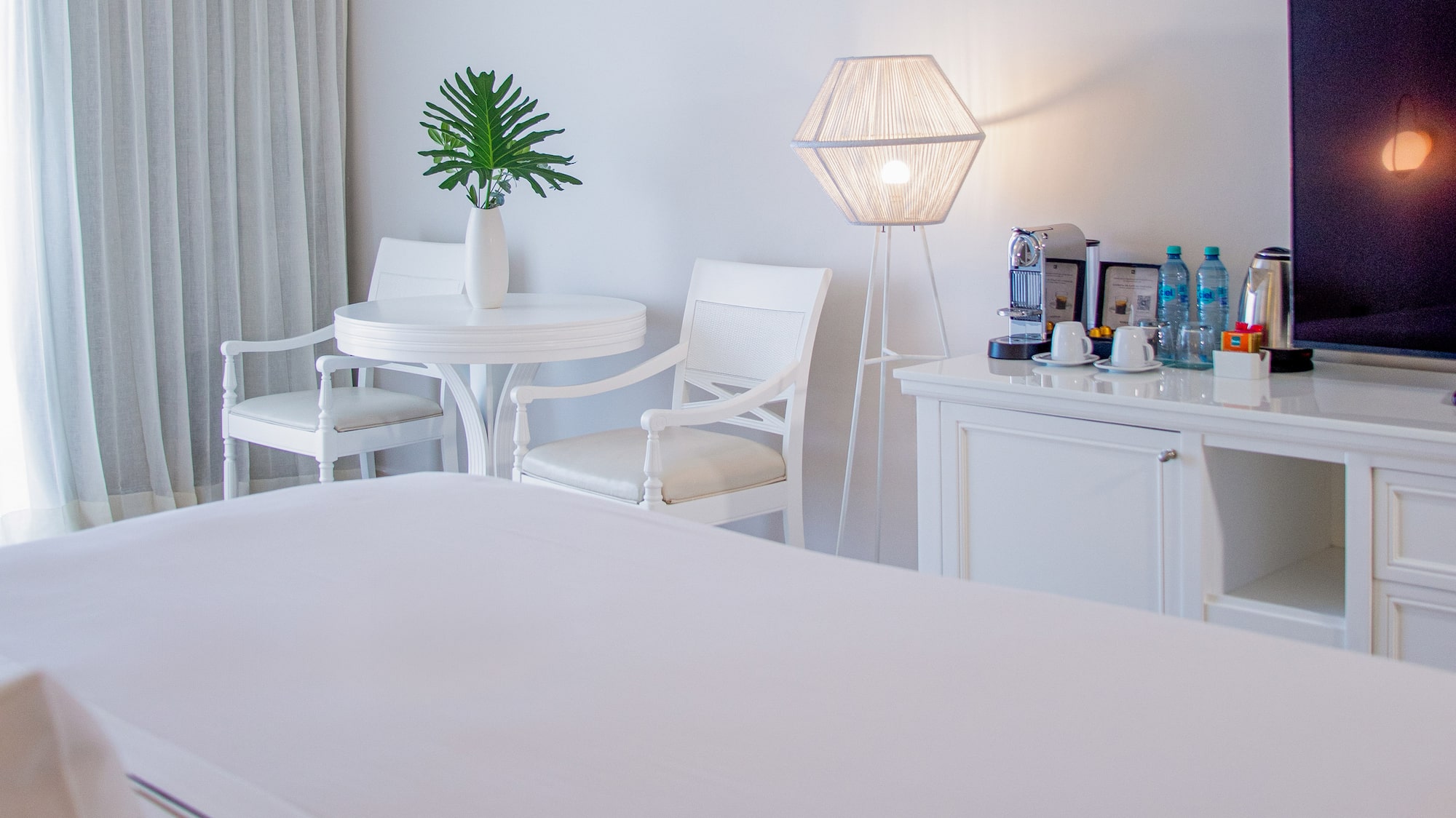 a room with a television and a table