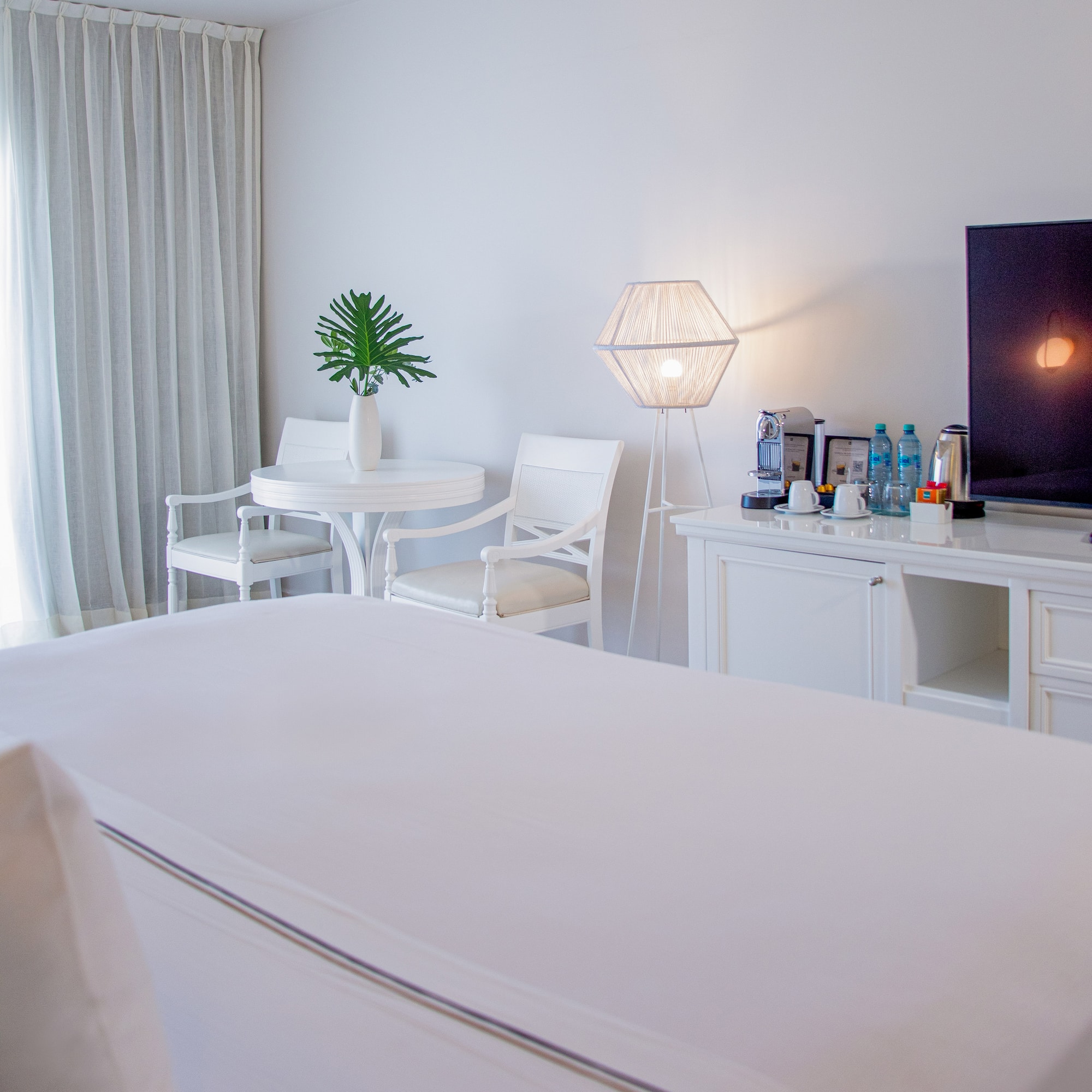 a room with a television and a table