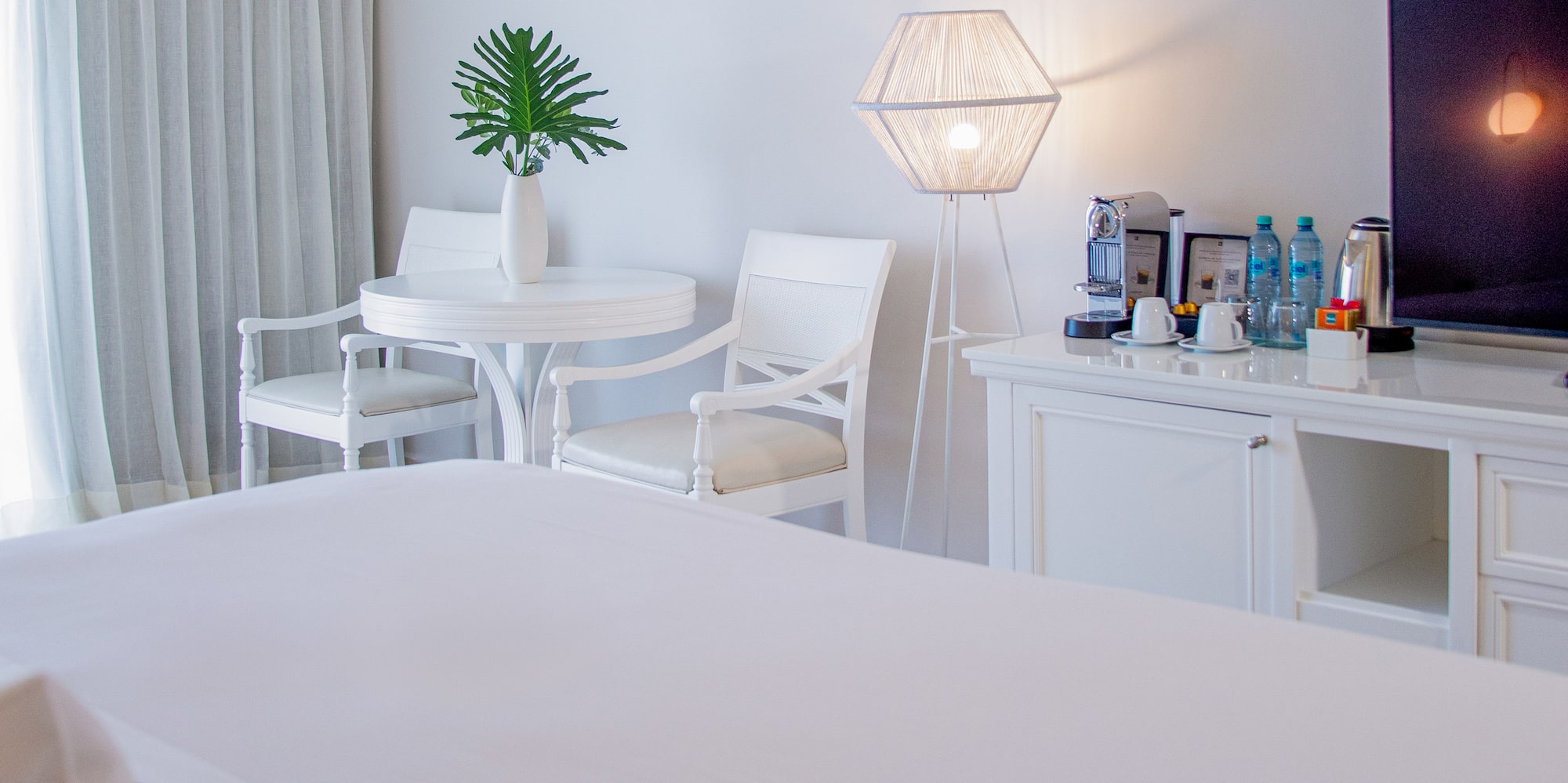 a room with a television and a table