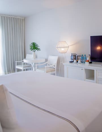 a room with a television and a table