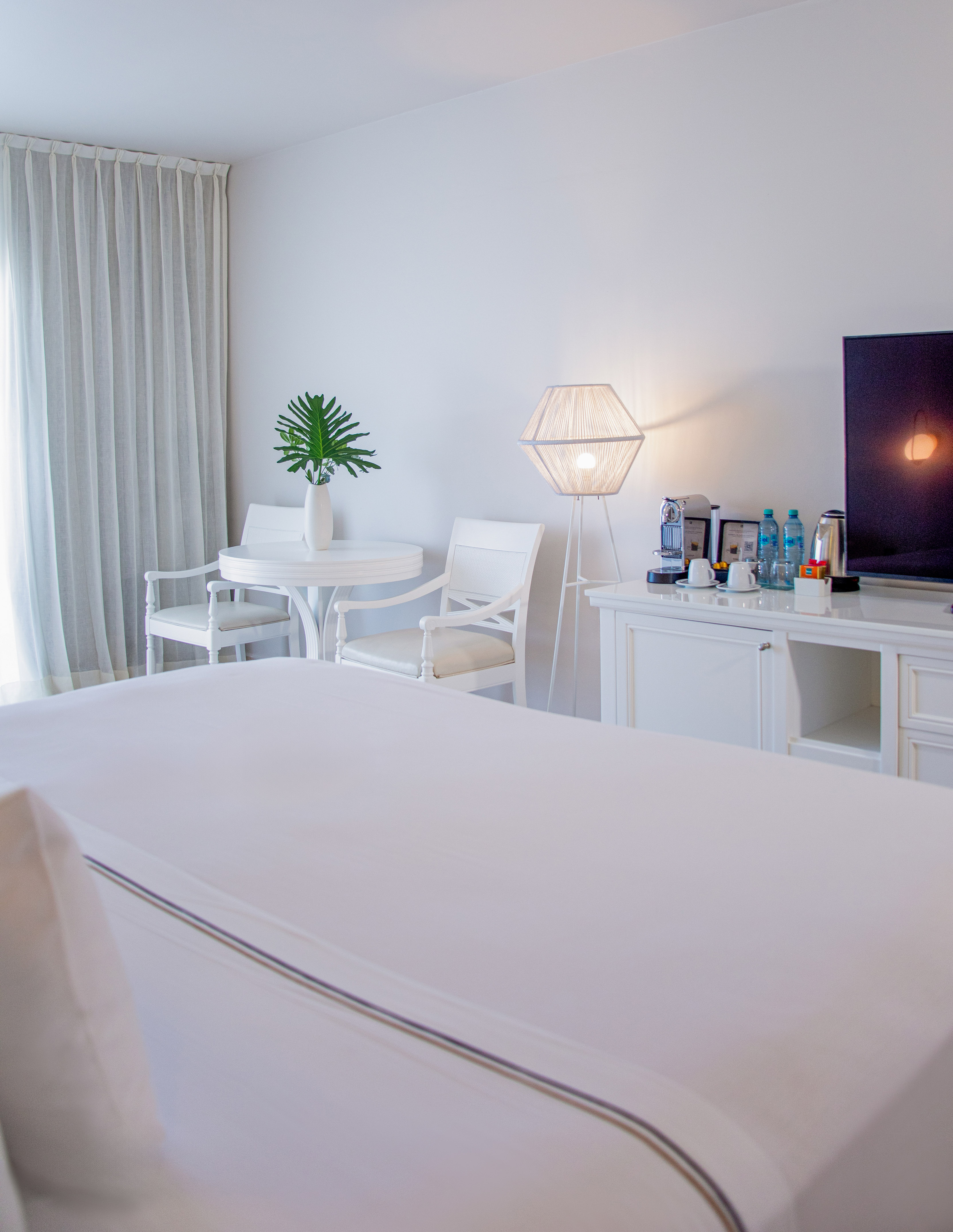 a room with a television and a table