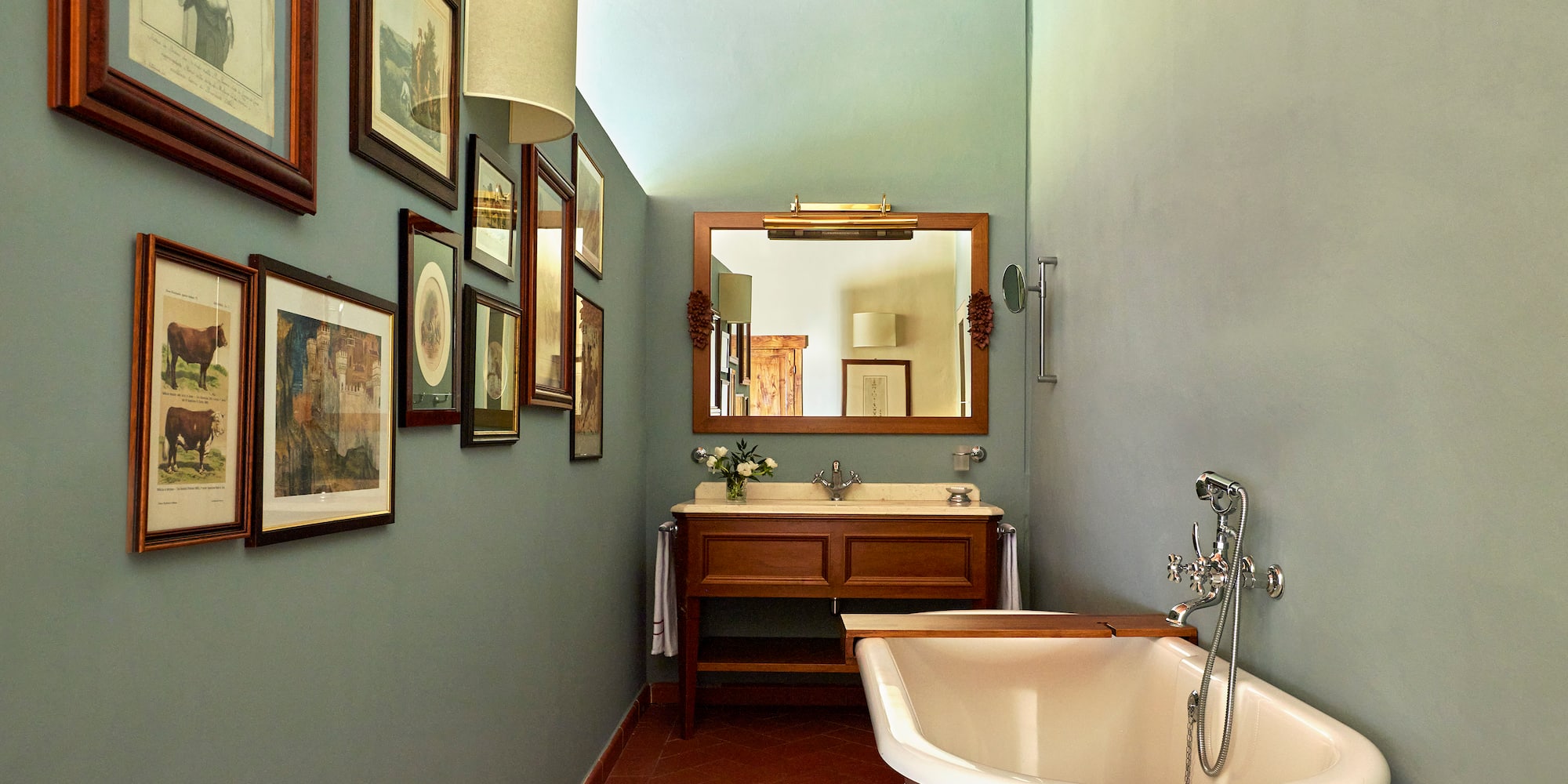 a bathroom with a tub and sink
