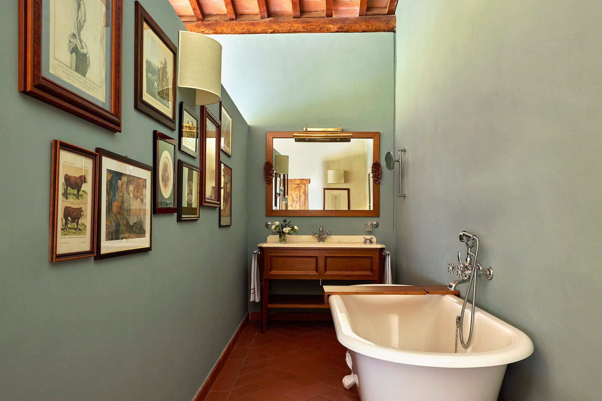 a bathroom with a tub and sink