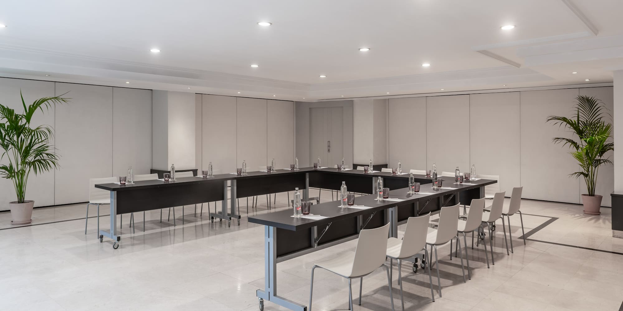 a room with tables and chairs