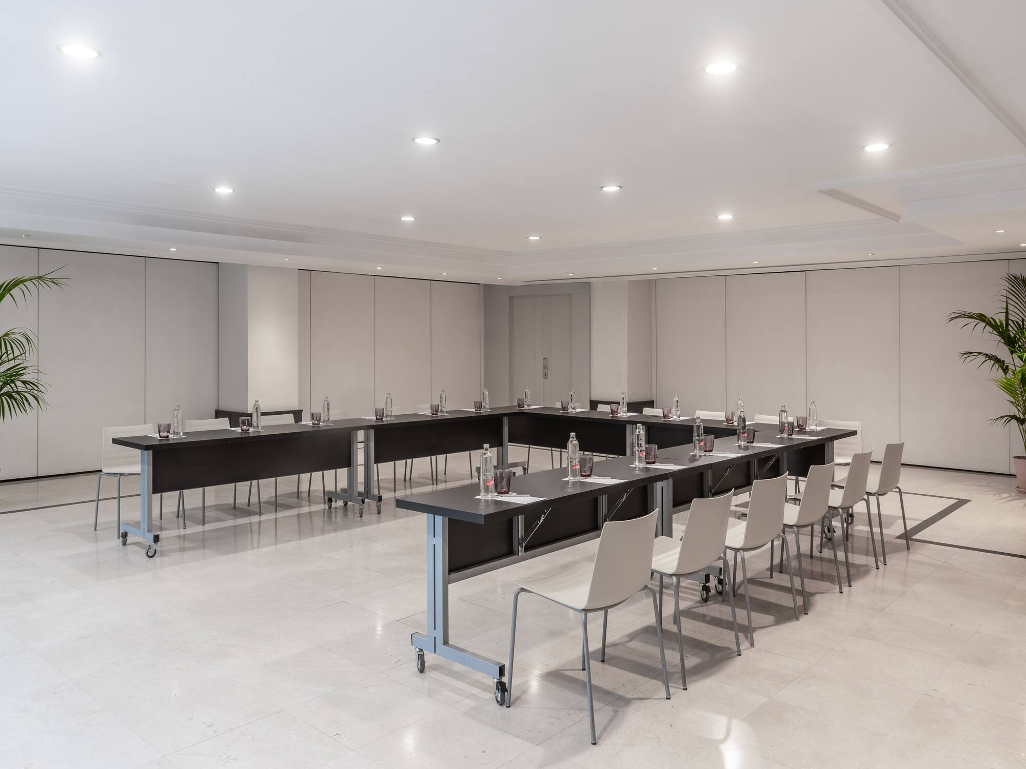 a room with tables and chairs