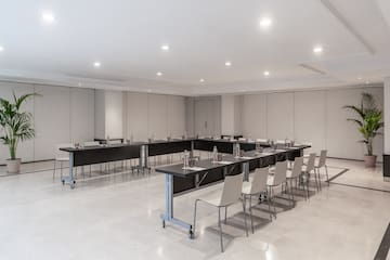 a room with tables and chairs