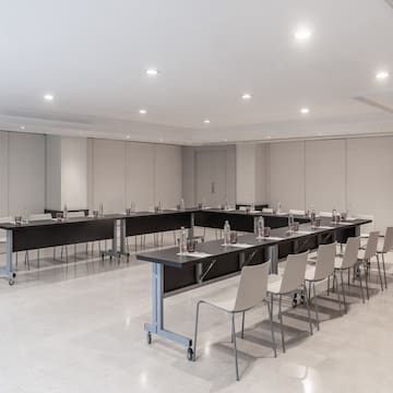 a room with tables and chairs