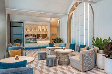 a room with tables and chairs